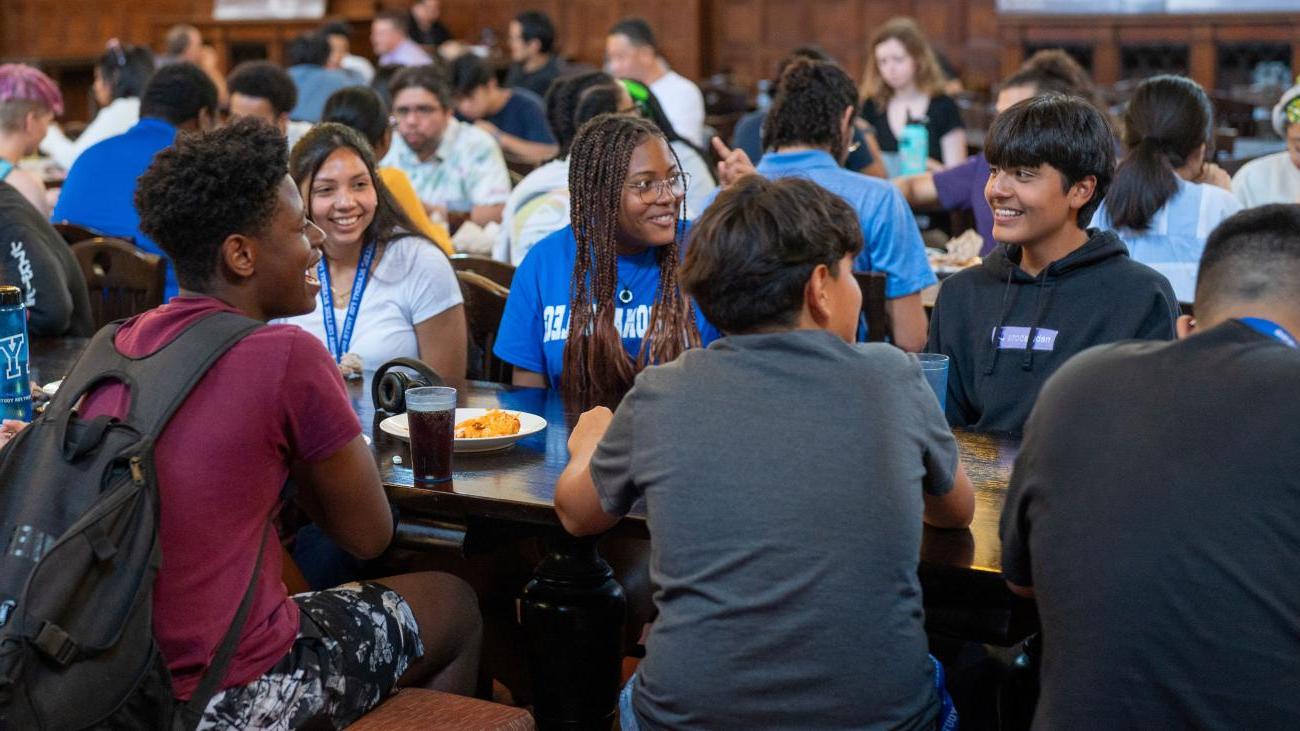 PAYS Scholars having conversations during lunch at Frary Dining Hall.